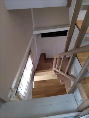 an overhead view of a staircase in a house at Baan Sangchai Beach in Ko Bon