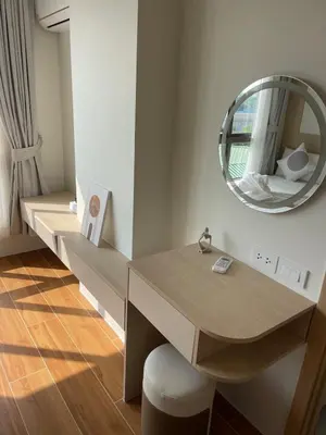 a room with a desk and a mirror at One-bedroom apartments with kitchen in Phuket Town