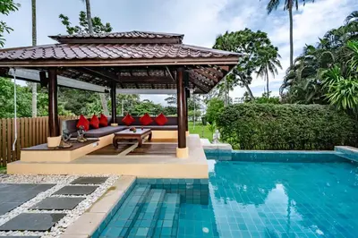a gazebo next to a swimming pool at Villa SALSA PRIVATE POOL in Ko Yao Noi