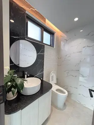 a bathroom with a sink and a toilet at Mountain breeze villa phuket in Ban Bang Khu