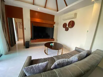 a living room with a couch and a table at Pool Villa Private near Rawai Beach 2 bedrooms 3D9 in Rawai Beach