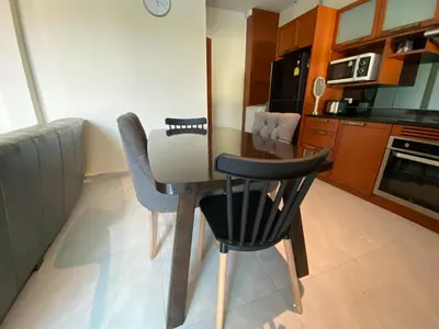 a kitchen with a table and chairs in a room at Pool Villa Private near Rawai Beach 2 bedrooms 3D9 in Rawai Beach