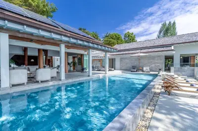 an image of a swimming pool in a house at Villa Amankara in Phuket Town