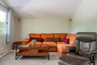 a living room with a couch and a coffee table at Flora 2 Bedroom HouseNear Naiharn - Rawai Beach in Rawai Beach