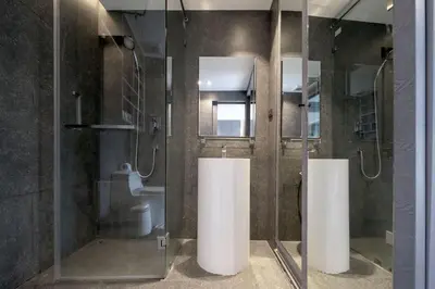 a bathroom with a glass shower and a toilet at Tropics Hill View Apartment CTG L706 at Kamala Residence, Top Amenities, Close to the Beach and Fantasea in Kamala Beach