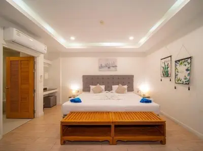 a bedroom with a large white bed in a room at 4Luxury Pool Villa 4 Bedrooms Private Pool Kitchen in Ban Bang La