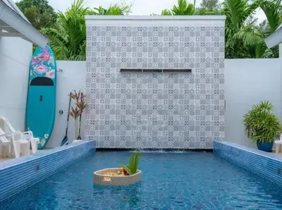a swimming pool in a house with a pool at 4Luxury Pool Villa 4 Bedrooms Private Pool Kitchen in Ban Bang La