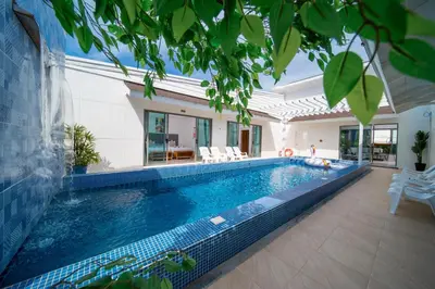 a swimming pool in the middle of a house at 3Elegant 4BR Villa with Pool in Ban Bang La
