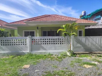 a white fence in front of a house at Home Tambon Bang tao 2BR Near Beach in Surin Beach