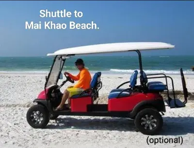 a person sitting in a golf cart on the beach at Orchidilla Residence Phuket Mai Khao Beach - SHAPlus in Mai Khao Beach