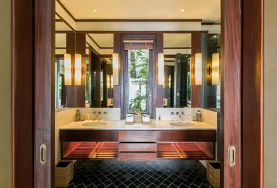 a bathroom with two sinks and a large mirror at Villa Daran Luxury Villa with Panoramic Views & 5-Star Services in Kamala Beach