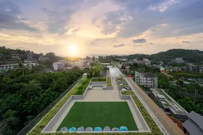 an aerial view of a park in a city at Surin Mida Grande residence with jacuzzi and sea view - Bang Tao & Surin beach in Surin Beach