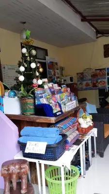 a store with a christmas tree on a table at Nan Inn Bungalow in Karon Beach