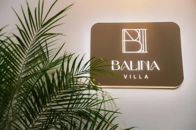 a sign that reads balma villa next to a plant at Balina Private Pool Villa in Ban Chin Tham Mai