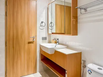 a bathroom with a sink and a toilet at Laguna BeachSide Apartment in Bang Tao Beach