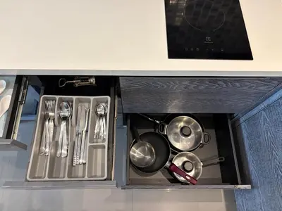 a kitchen drawer with pots and pans and utensils at Citygate Kamala beach, luxury apartment, Phuket in Kamala Beach