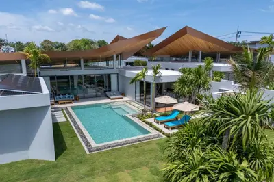 an aerial view of a house with a swimming pool at New & Exclusive! Private 4BR Zenithy Luxe Pool Villa near Laguna in Bang Tao Beach