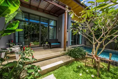 a villa with a pool and a house at VILLA Emere Private Pool Nai Harn beach in Nai Harn Beach