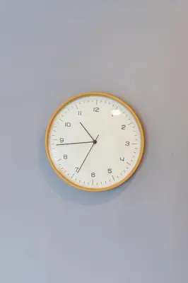 a clock on a white wall with a gold rim at Mountain View 1 Bed Apt T2-723 in Chalong