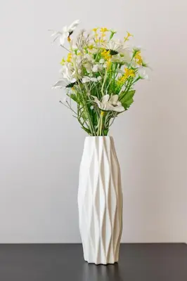 a white vase with flowers in it on a table at Mountain View 1 Bed Apt T2-723 in Chalong