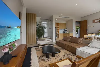a living room with a couch and a table at Chalong Bay View 3BR Pool Villa Long One A4 in Chalong