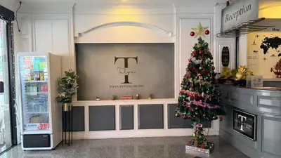 a christmas tree in the front of a store at Cocoon Talya Hotel in Patong Beach
