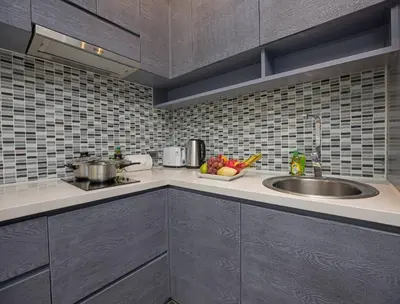 a kitchen with a sink and a counter top at Kamala Suite CTG L202, Top Amenities near Cafe del Mar and Fantasea in Kamala Beach