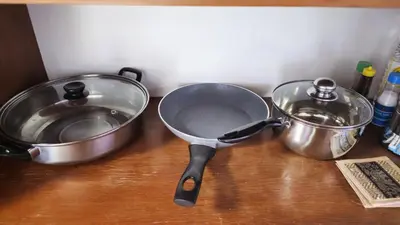 two pots and pans sitting on top of a counter at Rawai Naiharn 3 bedroom house in Rawai Beach