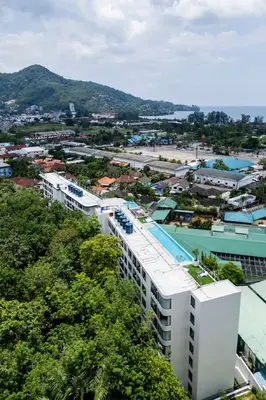 an aerial view of a building with a tennis court at 1-bd apartment on Kamala beach in Kamala Beach