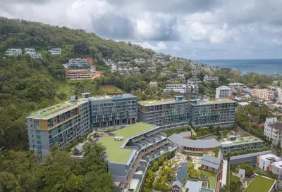 an aerial view of a city with buildings at Seaview, 1 bd, Surin beach in Surin Beach