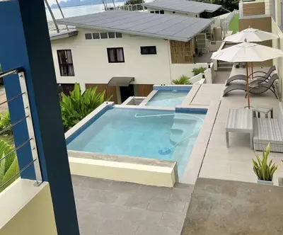 a swimming pool in the backyard of a house at Villa Miyoko Ko Yao Noi Enjoy nature's beauty and stunning sunsets in Ko Yao Noi