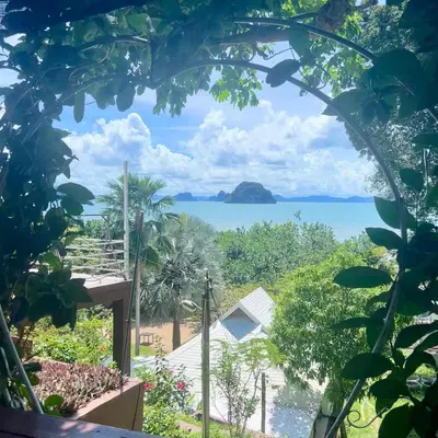 a view of the ocean from the garden at NATUR - Krabi Campsite Glamping & Camping in Krabi town