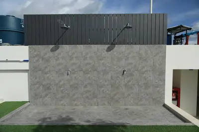 a stone wall with two lights on top of it at Apartment near the sea Kamala beach 601 in Kamala Beach