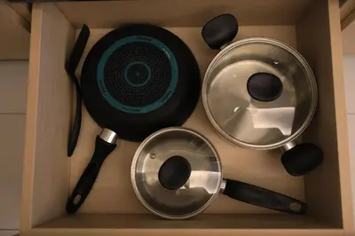 a box with various kitchen utensils and a speaker at Apartment near the sea Kamala beach 601 in Kamala Beach
