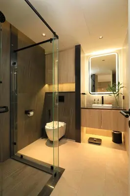 a bathroom with a glass shower and a toilet at New 1bdr Apartment Layan C518 in Ko Kala