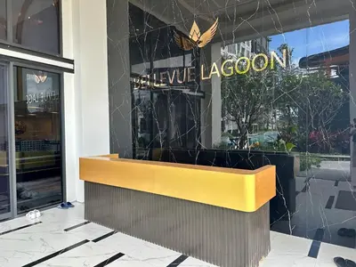 a yellow bench in front of a store at Bellevue lagoon 20 units in Laguna Phuket