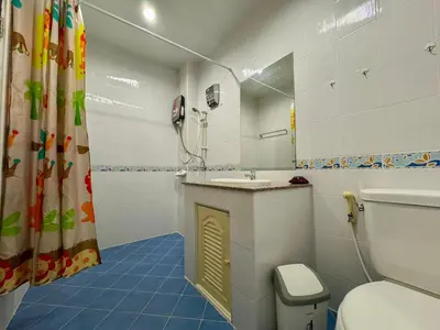 a bathroom with a toilet and a sink and a shower at Ananas Central Phuket Hostel in Ban Ket Ho