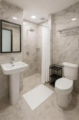 a bathroom with a toilet and a sink and a shower at 1 bedroom Naiharn Beach Condo in Rawai Beach
