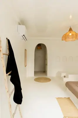a room with white walls and a ceiling at The hidden home in Patong Beach