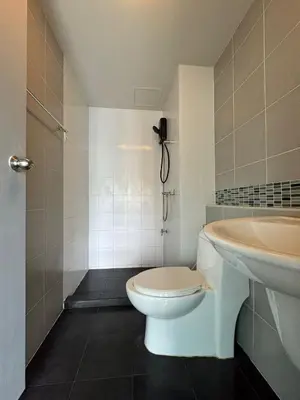 a bathroom with a toilet and a sink at Dcondo kathu phuket in Kathu
