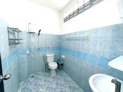 a bathroom with a toilet and a sink and a shower at Patong Canal Villa 110 in Patong Beach