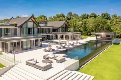 an aerial view of a house with a swimming pool at Villa Amarasara in Phuket Town
