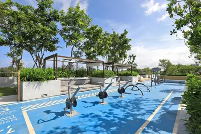 an image of a swimming pool with exercise equipment at 2 bdr Apartments Laguna Beachside 50m from Bangtao Beach in Bang Tao Beach