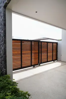 a large window with wooden blinds on a house at Villa Altessa 3BR Modern Loft II Botanica in Ban Pak Lak