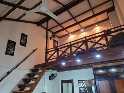 a room with a staircase and a ceiling at Monkey apartment 6 in Patong Beach