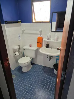 a bathroom with a toilet and a sink at Monkey apartment 6 in Patong Beach