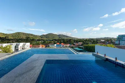 a swimming pool on the roof of a building at Relife Zen 2 min to Nai Harn beach in Rawai Beach