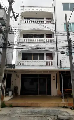 an external view of a building at XX Go Inn Phuket Patong Beach - ป่าตองบีช in Patong Beach