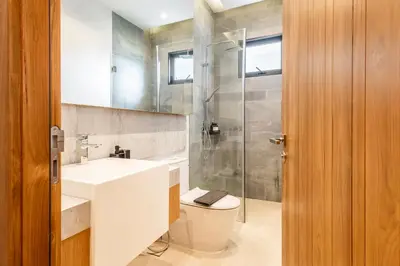 a bathroom with a toilet and a sink and a shower at Botanica Foresta B10 in Ban Nong Chaeng