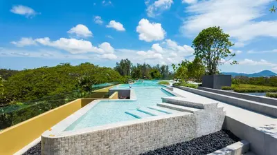 a swimming pool on the roof of a house at BeachSide and SeaSide Residences Apartment 200 m to Bang Tao Beach in Bang Tao Beach